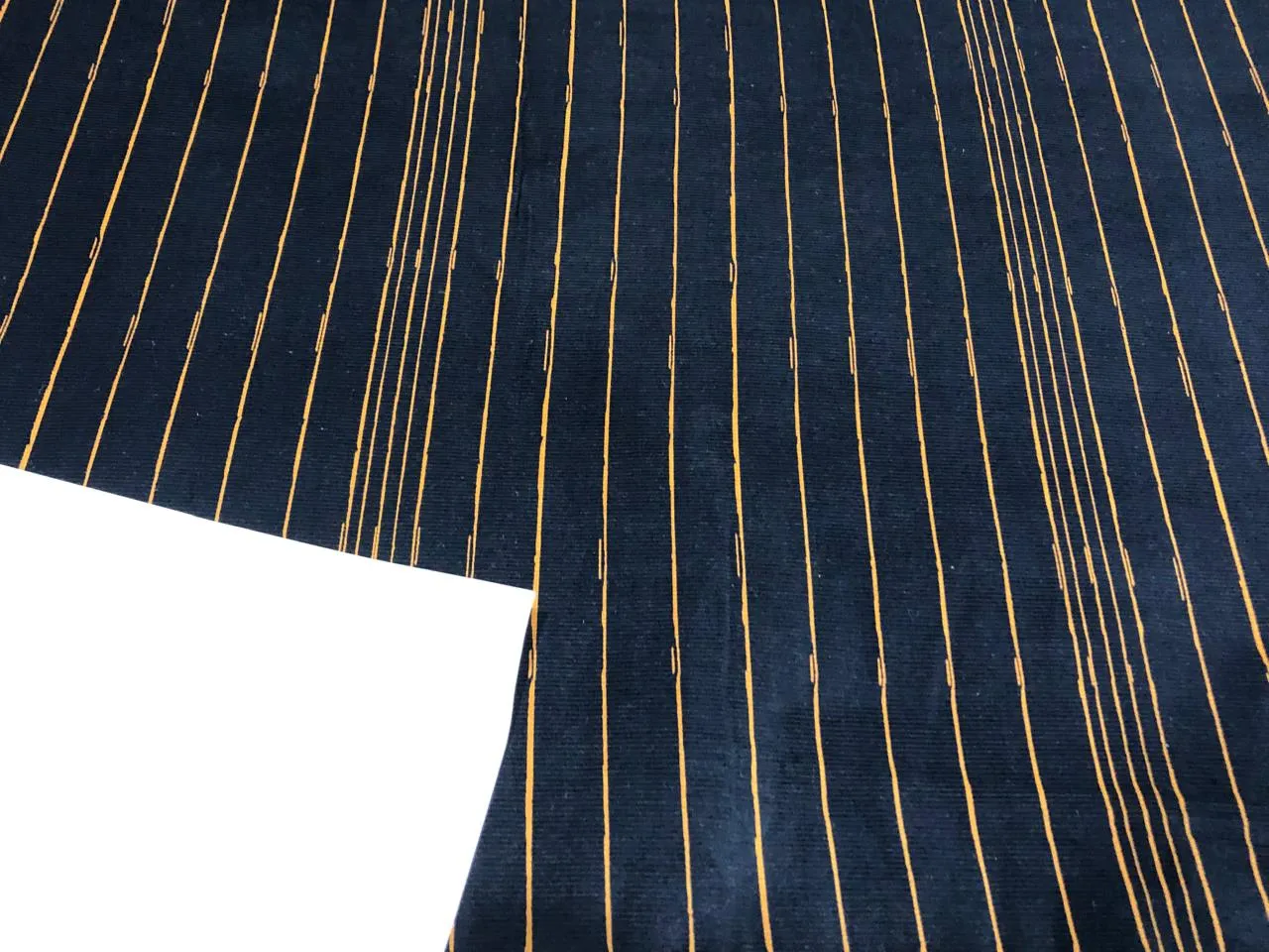 100% Cotton  corduroy Print 56" wide available in 2 styles  Navy with mustard stripe and Navy WITH