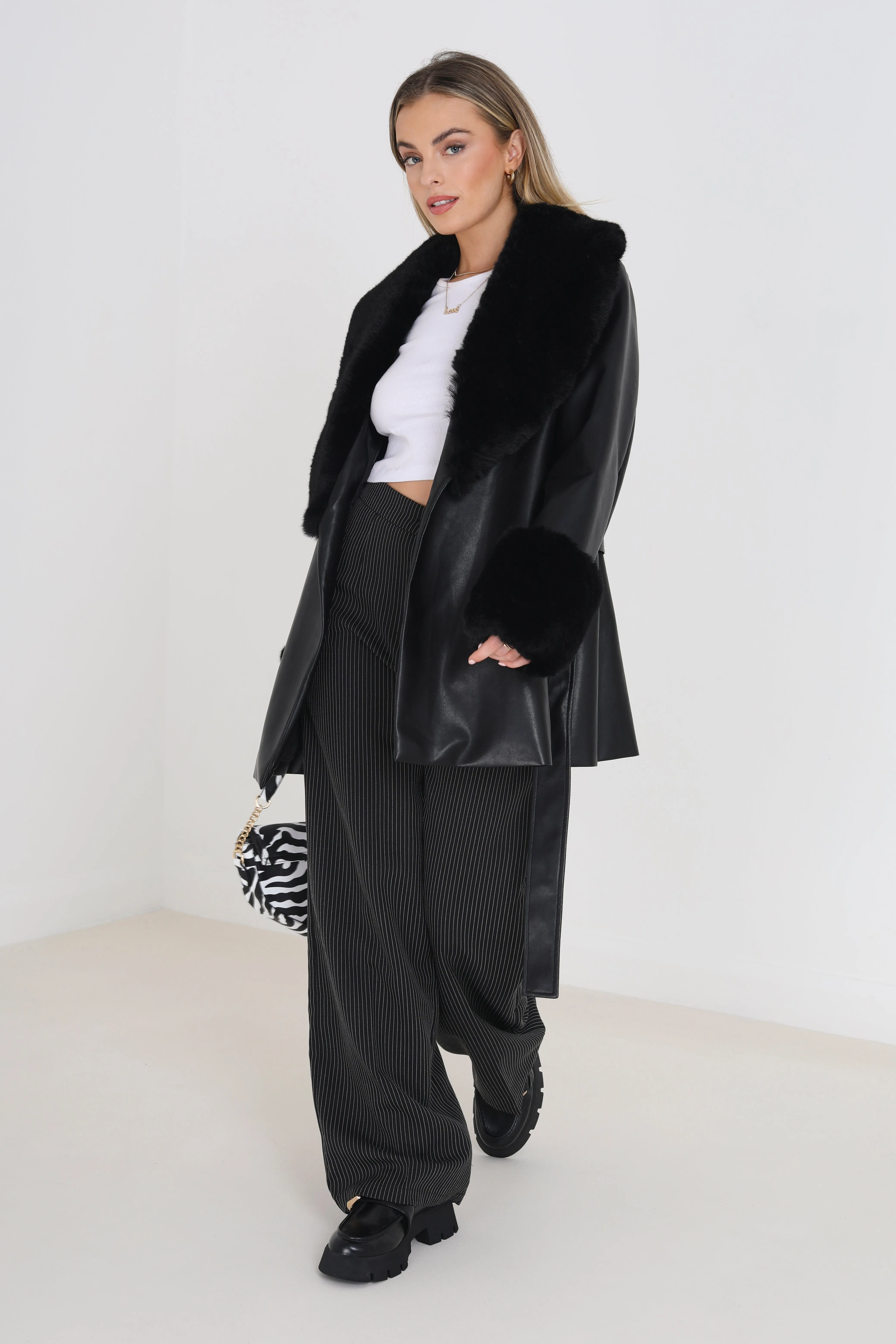 SHORT PU WRAP JACKET WITH FAUX FUR TRIMS